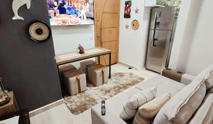VENDA DE SALA LIVING DE 34m2 ( sem elevador ) condomínio baixo E VAGA DE GARAGEM COLETIVA INSUFICIENTE NA PONTA DA PRAIA EM SANTOS-SP