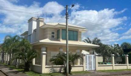 Casa 3 Dormitórios à venda no Bairro VILLAGE com 320 m² de área privativa - 3 vagas de garagem