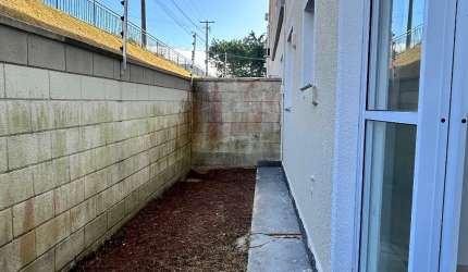 Apartamento térreo com quintal privativo