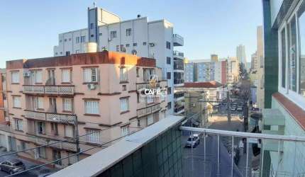 Amplo apartamento central com 3 dormitórios, mais dependência, sala com 2 ambien