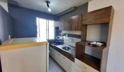 Apartamento de 2 dormitórios com vaga de estacionamento.