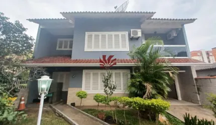 Casa com 4 quartos para alugar na Rua Quinze de Novembro, 186, Nossa Senhora das Graças, Canoas por R$ 7.000