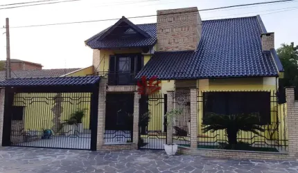 Casa com 3 quartos à venda na Rua João Nicolau, 109, Fátima, Canoas por R$ 1.490.000