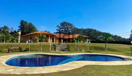 Chácara com 15000 m2 de terreno e cachoeira particular em condominio Porta do Sol.