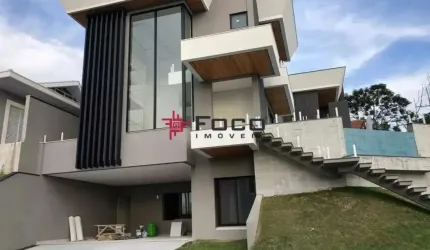 Casa com 4 dormitórios á venda, 477 m2 por R$ 3.600.000,00 - Condomínio Residencial Jaguary -