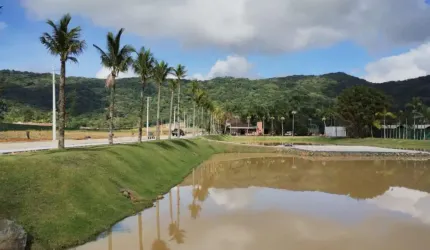TERRENO À VENDA EM CONDOMINIO FECHADO, NA CIDADE DE PENHA R$ 730.000,00