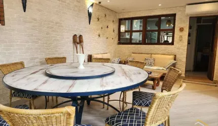 Village com 3 dormitórios à venda, 130 m² por R$ 2.660.000,00 - Riviera Módulo 21 - Bertioga/SP
