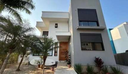 Casa em condomínio fechado com 4 quartos à venda no Cachoeira do Bom Jesus, Florianópolis  por R$ 2.395.000