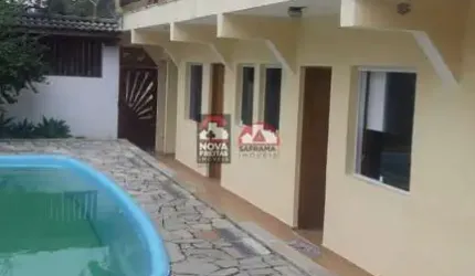 TERRENO COM SUÍTES