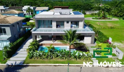 LOCAÇÃO POR TEMPORADA | LUXUOSA CASA EM CONDOMÍNIO PÉ NA AREIA.