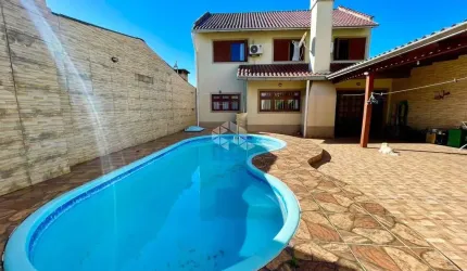 Casa com 3 quartos à venda na Rua Ernesto da Silva Rocha, 1254, Estância Velha, Canoas por R$ 584.000