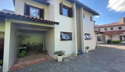 Casa em condomínio fechado com 3 quartos à venda na Rua Santa Helena, 60, Centro, Canoas por R$ 595.000