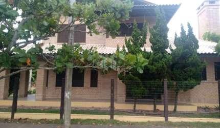 Casa com 4 quartos à venda na Das Orquídeas, 590, Capão Novo, Capão da Canoa por R$ 1.050.000