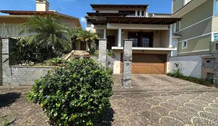 Casa com 4 quartos à venda na Rua Vinícius de Moraes, 265, Marechal Rondon, Canoas por R$ 1.550.000