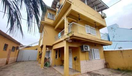 Casa com 3 quartos à venda na Rua Afonso Dias, 180, Marechal Rondon, Canoas por R$ 1.700.000