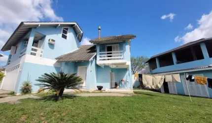 Casa em condomínio fechado com 4 quartos à venda na Rua Acácias, 161, Feitoria, São Leopoldo por R$ 900.000