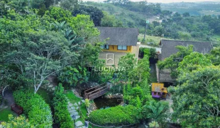 Ótimo clima! Casa com 4 suítes em condomínio fechado - Chã Grande/PE