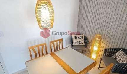 Apto com 2 dormitórios e varanda gourmet à venda entre as Praias Grande e Tenório