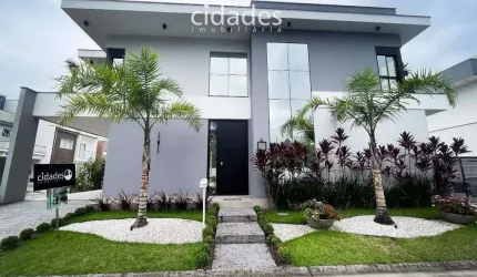 Casa com 3 dormitórios e suite em condomínio fechado em Biguaçu/SC