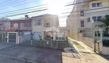 Casa com 3 quartos à venda na Rua Dona Amélia, 73, Santa Tereza, Porto Alegre por R$ 949.000