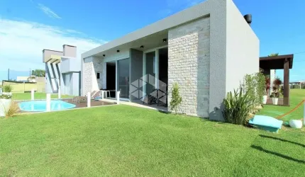 Casa em condomínio fechado com 4 quartos à venda na Avenida Diamante, 1, Rainha do Mar, Xangri-Lá por R$ 2.229.900