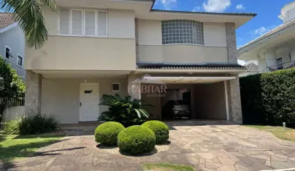 SOBRADO EM CONDOMINIO FECHADO COM 350 m² COM 4 SUITES