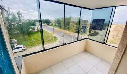 Apartamento 03 dormitórios a beira mar com sacada em Tramandaí