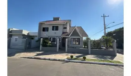 Casa à venda com 5 dormitórios sendo 4 suítes no bairro Igara em Canoas!