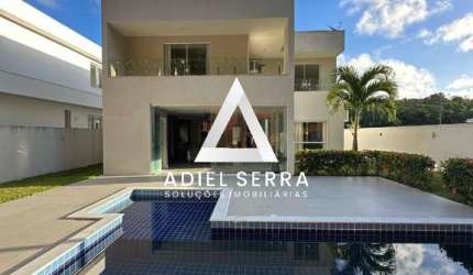 Alphaville litoral 3 - 4 quartos sendo 3 suítes - 2 lavabos - 4 vagas - Piscina e área gourmet - Sala ampla com pé direito duplo