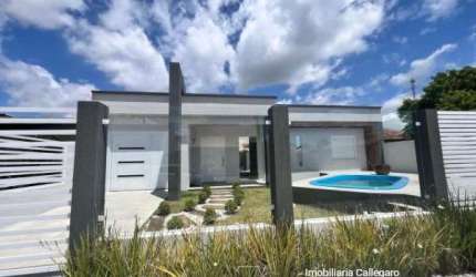 Casa com 3 quartos à venda na Rua Lagoa Vermelha, 01, Centro, Imbé por R$ 690.000