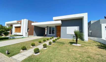 Casa em condomínio fechado com 3 quartos à venda na Rua Onório Germano, 2009, Condomínio Dubai Resort, Capão da Canoa por R$ 980.000