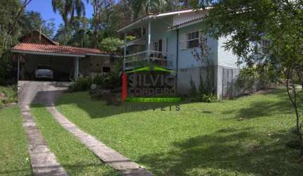 Casa com 3 quartos à venda na Servidão João Francisco Garcez, 65, Canto da Lagoa, Florianópolis por R$ 3.890.000