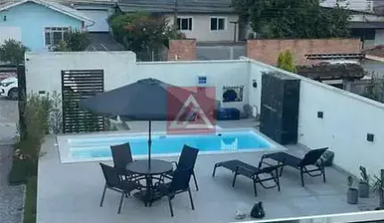 CASA COM TRÊS SUÍTES E PISCINA NA PONTE DO IMARUIM PALHOÇA