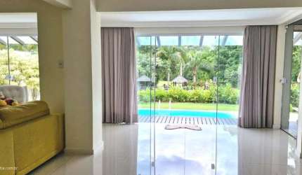 Casa em condomínio fechado com 4 quartos à venda no Cacupé, Florianópolis  por R$ 3.250.000