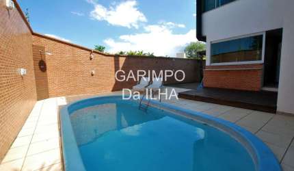 Casa em condomínio fechado com 4 quartos à venda no Cacupé, Florianópolis  por R$ 2.150.000