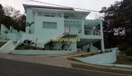 Casa de Alto Padrão com 4 Suítes, Cozinha Americana e Piscina á venda na reserva de Ibirapitanga Arujá divisa com Santa Isabel-SP