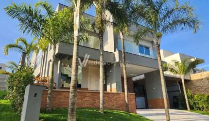Casa em condomínio fechado com 4 quartos para alugar na Rua das Abélias, 1, Alphaville Dom Pedro, Campinas, 354 m2 por R$ 23.000