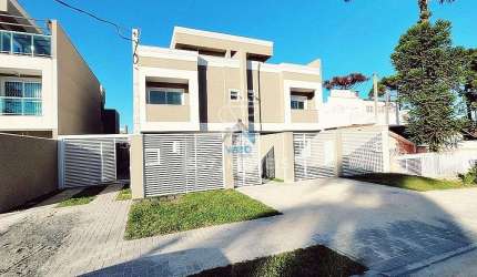 Sobrado tríplex alto padrão a venda no bairro Cajuru em Curitiba, com 03 quartos sendo uma suíte com sacada e amplo terraço descoberto.