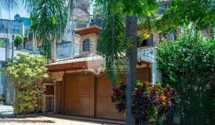Casa tipo para venda com 4 quartos, sendo 3 suítes, 509m²