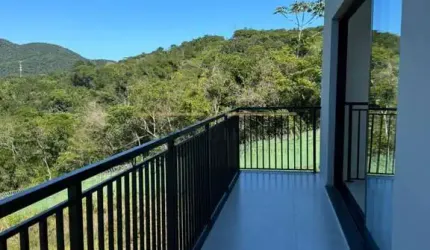 Casa em condomínio fechado com 3 quartos à venda no Sertão do Maruim, São José  por R$ 1.599.000