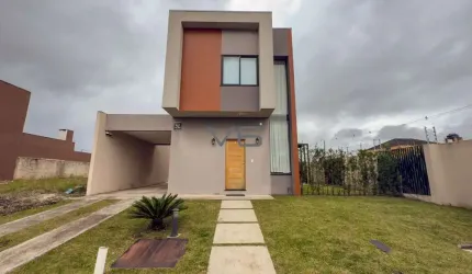 Sobrado em condomínio com 126,46m² privativos, 2 suítes, 2 vagas de garagem, no Ipê, São José dos Pinhais - PR.