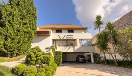 Casa alto padrão com 4 quartos, 664m² privativos, 9 vagas de garagem, no Ecoville, Curitiba - PR.