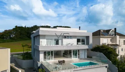 Casa Alto Padrão com 4 suítes, 583 m² privativos, 4 vagas de garagem, no Alphaville, Pinhais-PR.