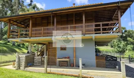 Sítio com 15.000 m², com ampla residencia de 309 m² com 4 quartos, toda cercada, com lago