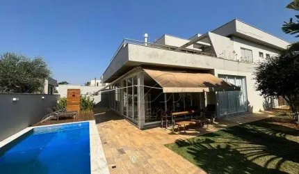 Excelente casa no Condomínio Reserva do Engenho, com 04 suítes. Piscina.