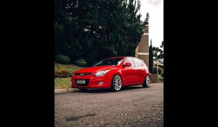 Hyundai i30 2.0 16v 145cv 5p aut.  - vermelha - 2009/2010