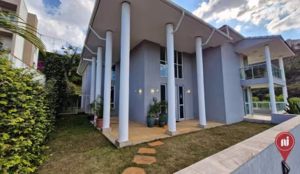 Casa com 4 dormitórios à venda, 412 m² por R$ 4.200.000,00 - Condomínio Vila Castela - Nova Lima/MG