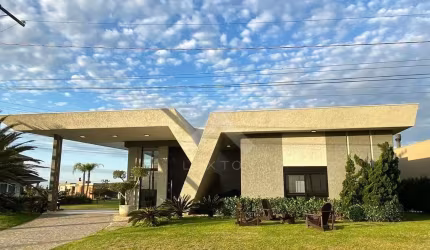 Casa em condomínio fechado com 4 quartos à venda na Avenida Diamante, 1173, Centro, Xangri-Lá por R$ 1.990.000