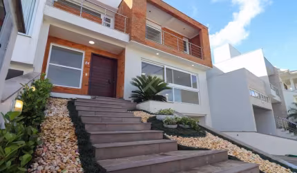 Casa em condomínio fechado com 3 quartos à venda na Rua Francisco Solano Borges, 200, Hípica, Porto Alegre por R$ 1.290.000