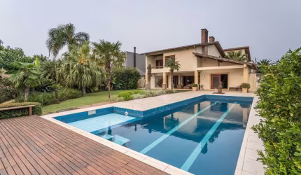 Casa em condomínio fechado com 5 quartos à venda na Avenida Juca Batista, 8000, Belém Novo, Porto Alegre por R$ 3.500.000